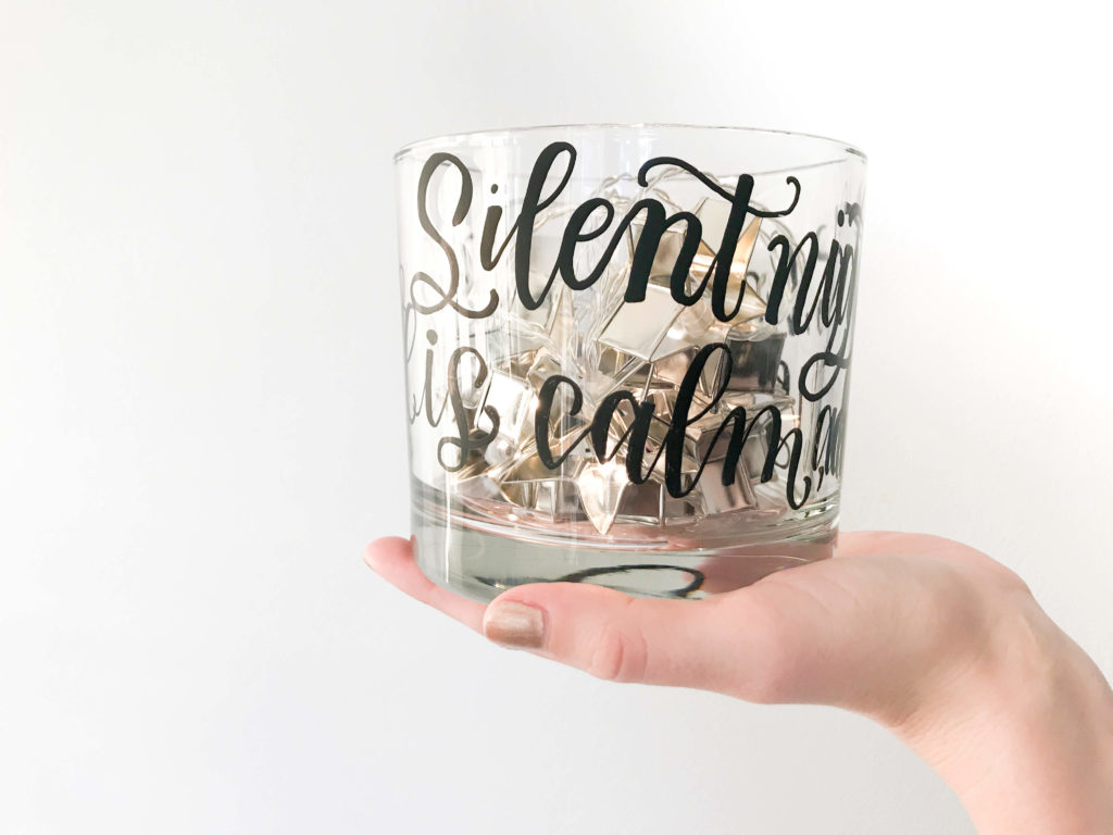 Learn how to hand letter a glass votive or vase with wrapping text with this step-by-step DIY tutorial from Amanda Arneill at amandaarneill.com