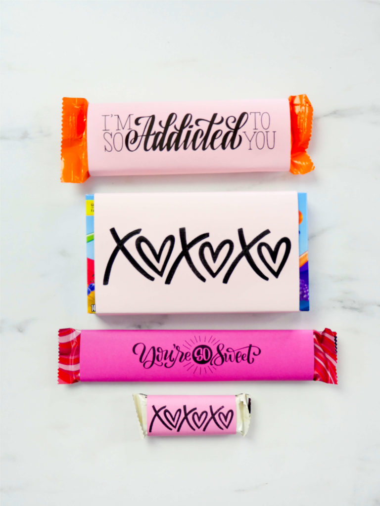 Customize your Valentine's favorite candy bar with this easy DIY tutorial and free printable candy bar covers (of all sizes) from amandaarneill.com