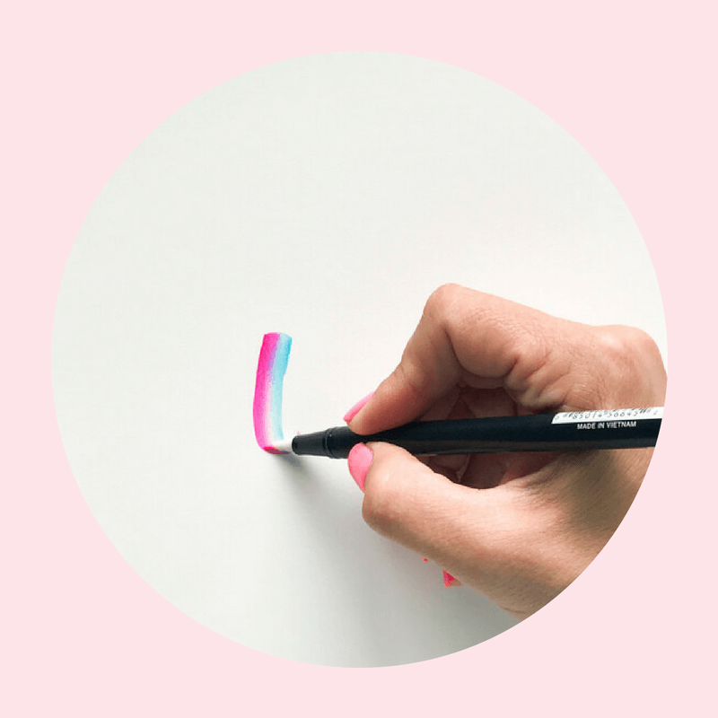 Learn how to create two color blended unicorn lettering within a single brush marker stroke using your Tombow Blended Dual Brush Pen (N00) with this free video tutorial and supply list from amandaarneill.com